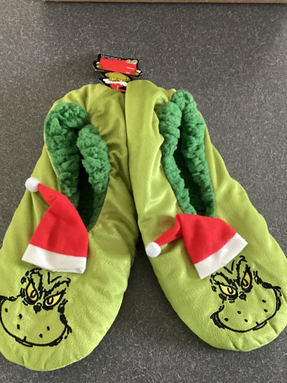 The Grinch slipper socks, kids large or women’s medium. Green  holiday slippers